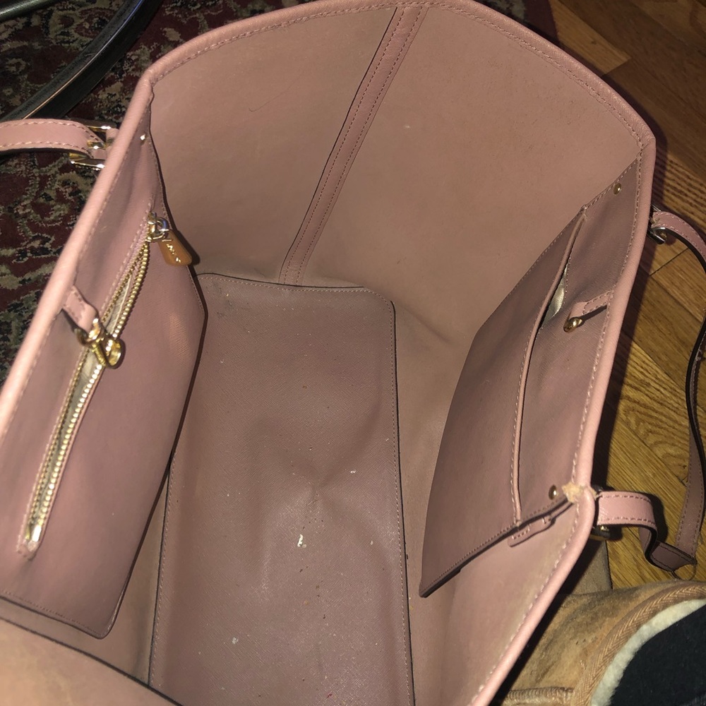 Michael Kors tote tan color besides some wear on strap in great used condition